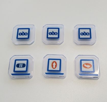 Plättchen der Blue-Bot Leiste in Voder-und Rückansicht