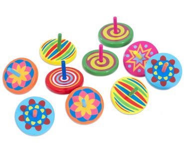 12 bunte Kreisel auf weißem Hintergrund