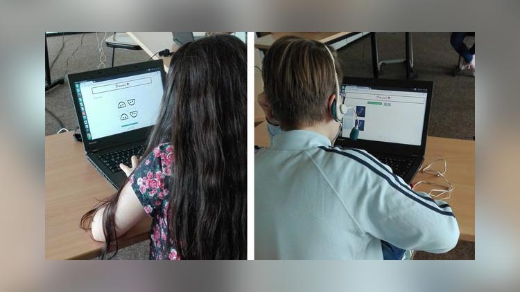 Schüler arbeiten am Laptop