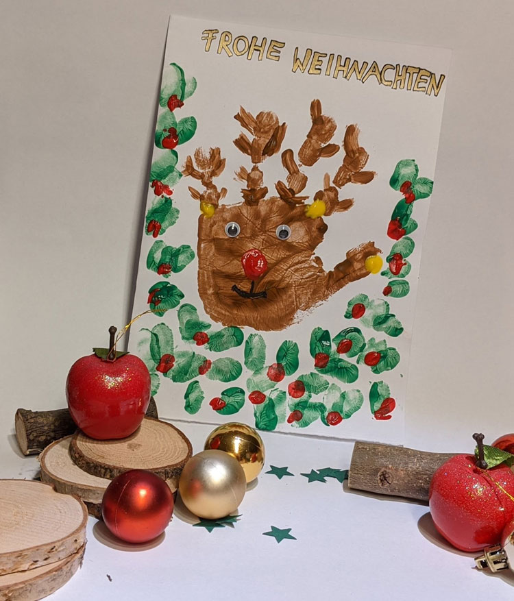 Weihnachtskarte Rudolph, the red-nosed Reindeer mit Fingerfarbe aus dem Betzold Shop gedruckt.