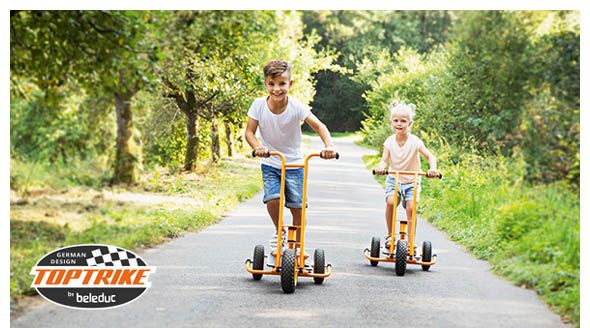 Kinder fahren mit TopTrike Rollern